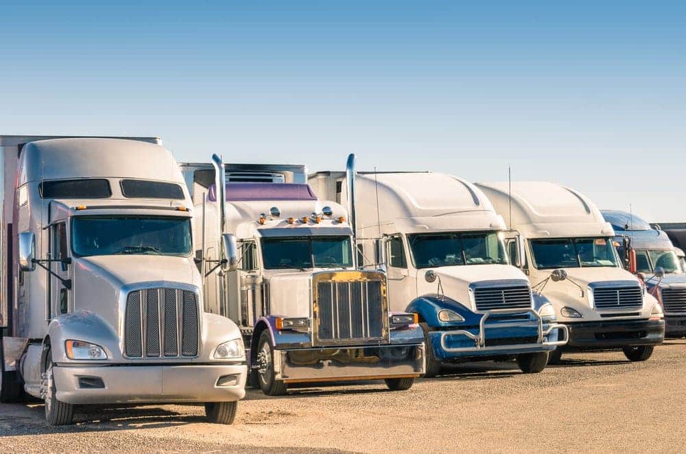 trucks parked on the road